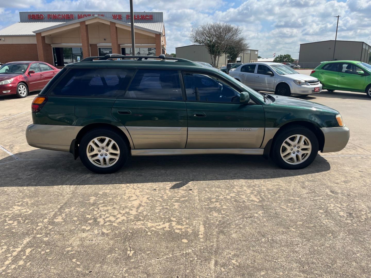 2003 green /TAN Subaru Outback Limited Wagon (4S3BH686737) with an 2.5L H4 SOHC 16V engine, 5-Speed Manual Overdrive transmission, located at 14700 Tomball Parkway 249, Houston, TX, 77086, (281) 444-2200, 29.928619, -95.504074 - Photo#7